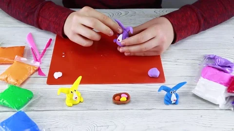 How to make an Easter bunny out of plasticine. Step 4 Stock Footage 148530707