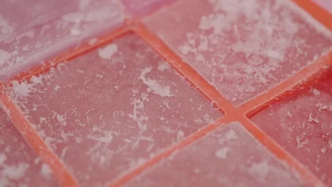 How to make ice cubes with a simple tray method Stock Footage 335065607