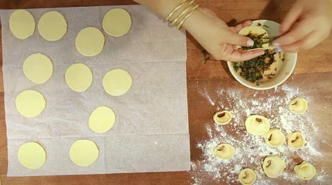 How to make Shish Barak with Yoghurt Recipe folding the dough Stock Footage 68821853