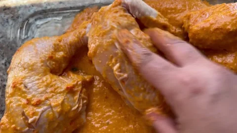 How to Marinate Chicken Pieces for Roasting Stock Footage 345321108