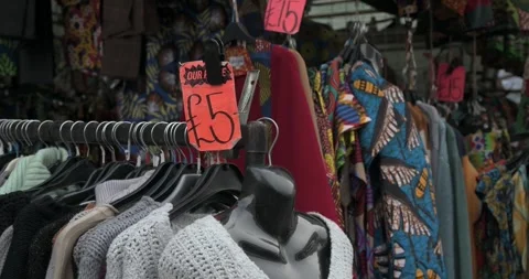 How much will you pay for clothes, Brixton, London, United Kingdom Stock Footage 267860206