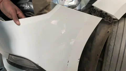 How to open and fixing car bumper close-up Vídeos de archivo 168143299