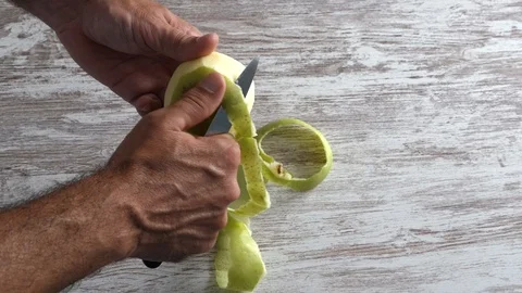 How to peel an apple Stock Footage 116501975