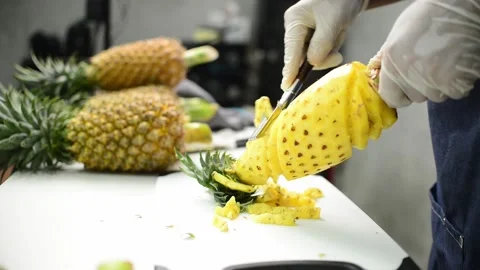 How to peel pineapple Stock Footage 159317400