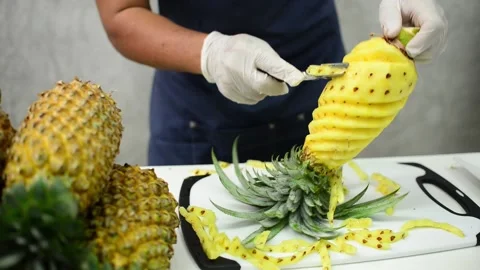 How to peel pineapple Stock Footage 159317404