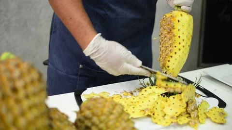 How to peel pineapple Stock Footage 159317405