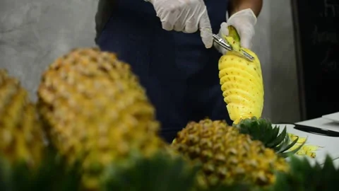 How to peel pineapple Stock Footage 159317407