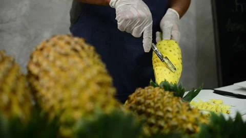 How to peel pineapple Stock Footage 159317408