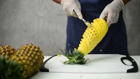 How to peel pineapple Stock Footage 159317416