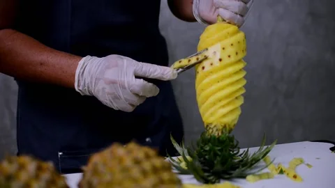 How to peel pineapple Stock Footage 159317419