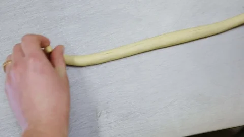 How to prepare cinnamon rolls Stock Footage 69777810