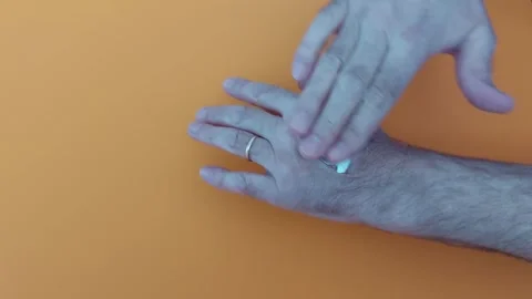 How to Properly Apply Cream to Your Hands Stock-Footage 305541085