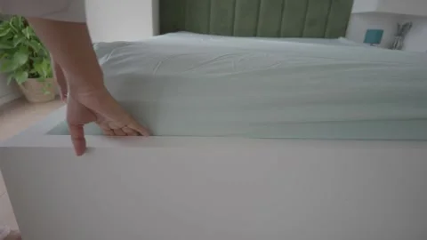 How to put on a mattress cover in an easy way Stock Footage 323986924