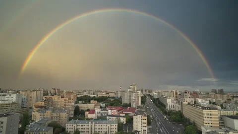 How a rainbow is formed over the city, timelapse Stock Footage 201871202