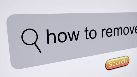 "how to remove" typing into search bar on computer screen 動画素材 125567941