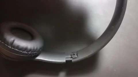 How to repair broken headphone with super glue Stock Footage 332176571