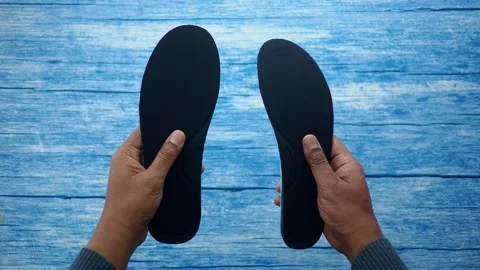 How to replace shoe insoles at home for comfort Stock Footage 334021228