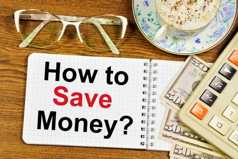 How to save money? A text label in the planning notebook. Stock Photos