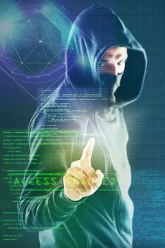 How secure are you really. Portrait of a menacing computer hacker posing agai Foto stock