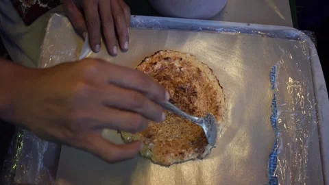 How to serve the egg crust until it is wrapped in a paper wrap Stock Footage 265934973