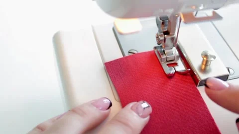 How to sew on a sewing machine without a seam and pins, using a magnetic limiter Stock Footage 169989706