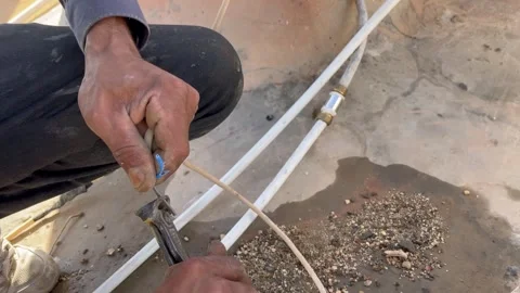 How to Strip Electric Cable Insulation Using Pliers Stock Footage 345611791