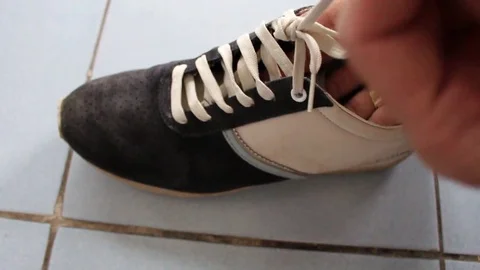 How to wear a shoe Stock Footage 73059723