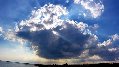 Howard Beach Sun Clouds Stock Photos