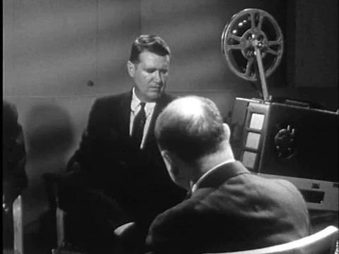 Howard Rome, Edwin S. Shneidman, Floyd S. Cornelison Jr., and Mary Hall watch aƒ Stock Footage 75281132