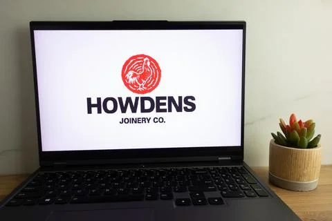 Howden Joinery Group plc logo displayed on laptop Stock Photos