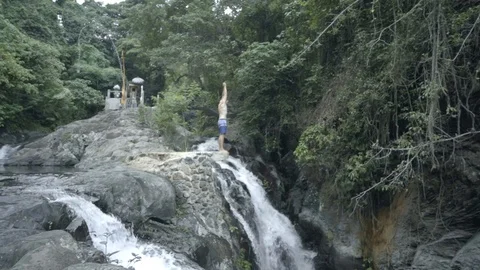 However, the big attraction is the canyoning, waterslides and cliff jumping. Stock Footage 126034044