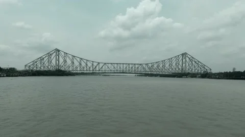 Howrah Bridge over Hooghly River at sunset, Kolkata, West Bengal, India Stock Footage 201747646