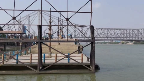 Howrah Station Ferry ghat,bridge, launch and the ganges Stock Footage 179614374