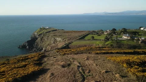 Howth Cliff Walk and Baily Lighthouse in Dublin Stock Footage 166625155