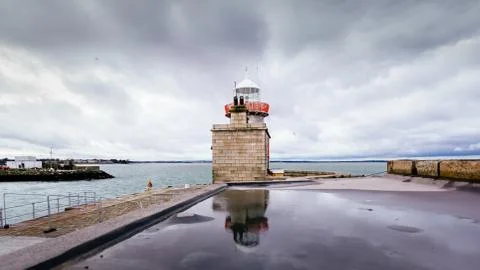 Howth Lighthouse reflected in water, Dublin, Ireland Stock Photos