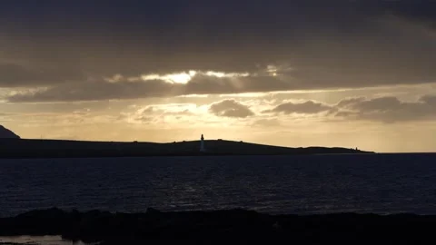 Hoy High lighthouse in Orkney during golden hour in HD Video stock 301190222