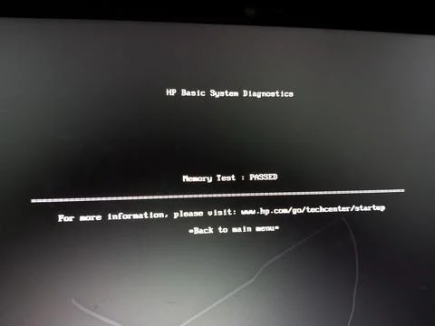 Hp Laptop displaying system alert message Stock Photos