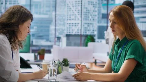 HR experts going through the selection process after the job interviews Stock Photos