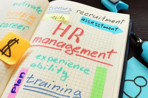 HR human resource management. Note and pen. Stock Photos