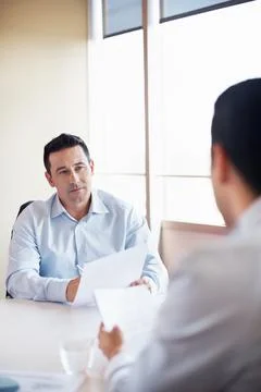 HR, man and interview with paperwork in office for hiring process, employee Fotos Stock