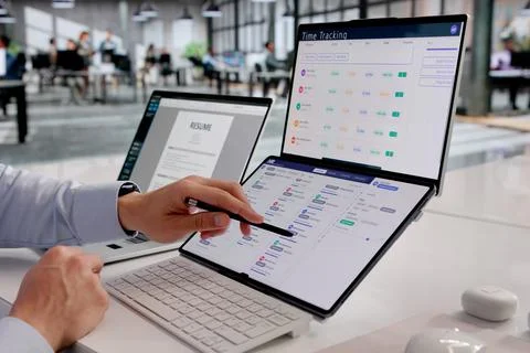 HR Manager Analyzing Staffing Software Data In A Corporate Setting Stock Photos