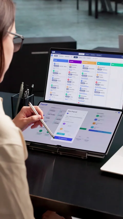 HR Manager Efficiently Processes Employee Payroll Stock Footage 339181690