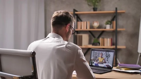 HR manager interviewing potential employee online Stock Footage 144368211