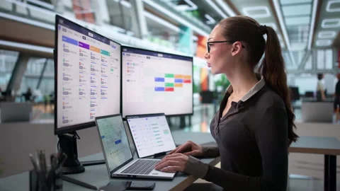 HR Manager Reviews Candidate Notes While Scheduling Interviews Stock Footage 344713440
