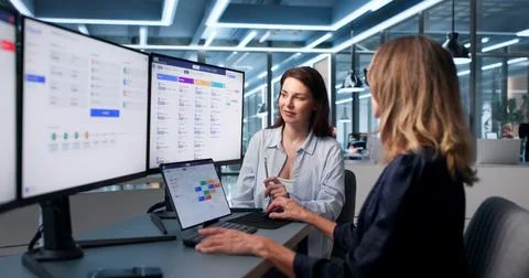 HR Manager Studies Candidate Information On Computer Screen During Recruitmen Фото