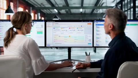 HR Managers Discuss Talent Performance Using Software Stock Footage 336366015