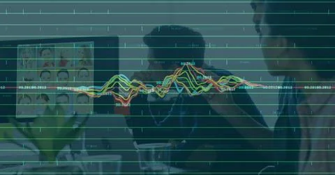 HR team leaning forward as presenter gesturing, reviewing headshots as waveform Foto stock