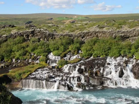 Hraunfossar waterfall in Iceland during summertime Stock Photos
