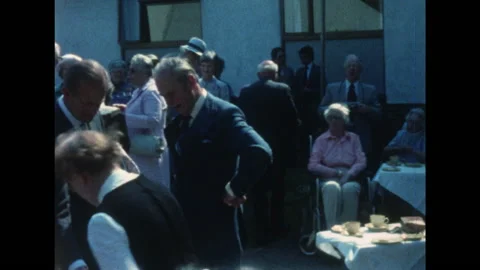 HRH Prince Phillip drinking tea and chatting Stock Footage 152021308
