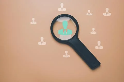 HRM or Human Resource Management, Magnifier glass focus to manager icon which Stock Photos